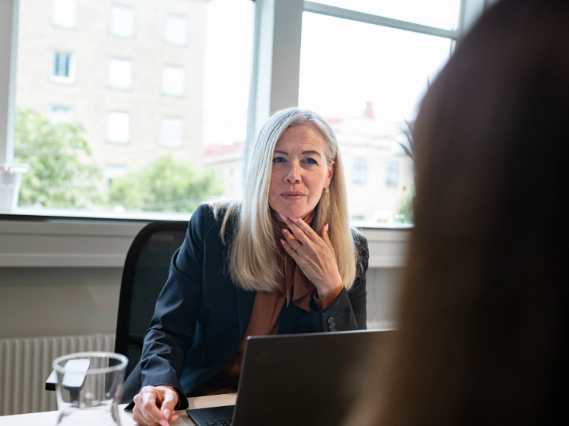 Businesswoman having meeting in office